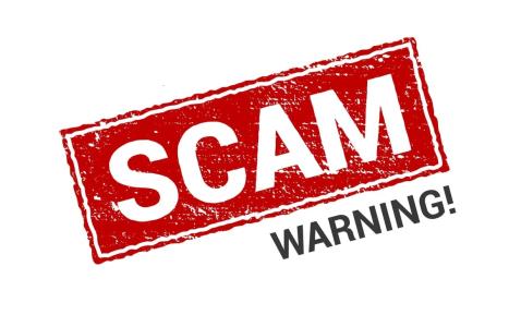 Warning sign with the text of Beware of Real Estate Scams; Strathium